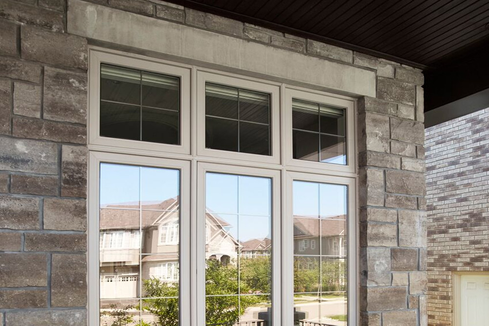 Awning Windows On Stone Wall Pollard Windows Doors