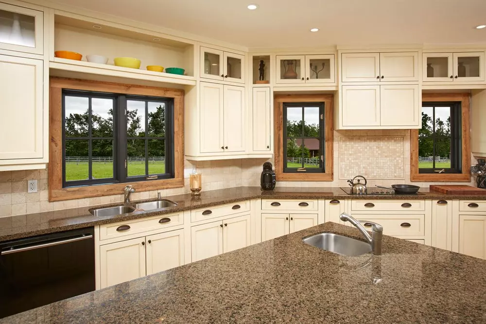 kitchen with wood casement windows painted in black