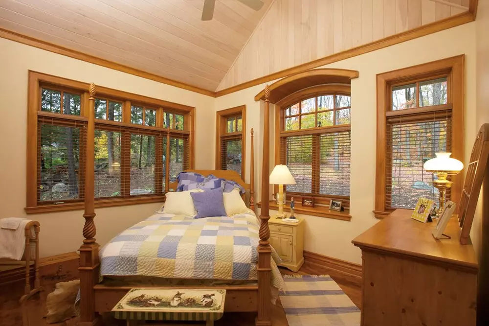 Wood casement windows in bedroom