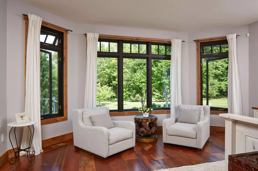 Living room with black frame windows - casement windows