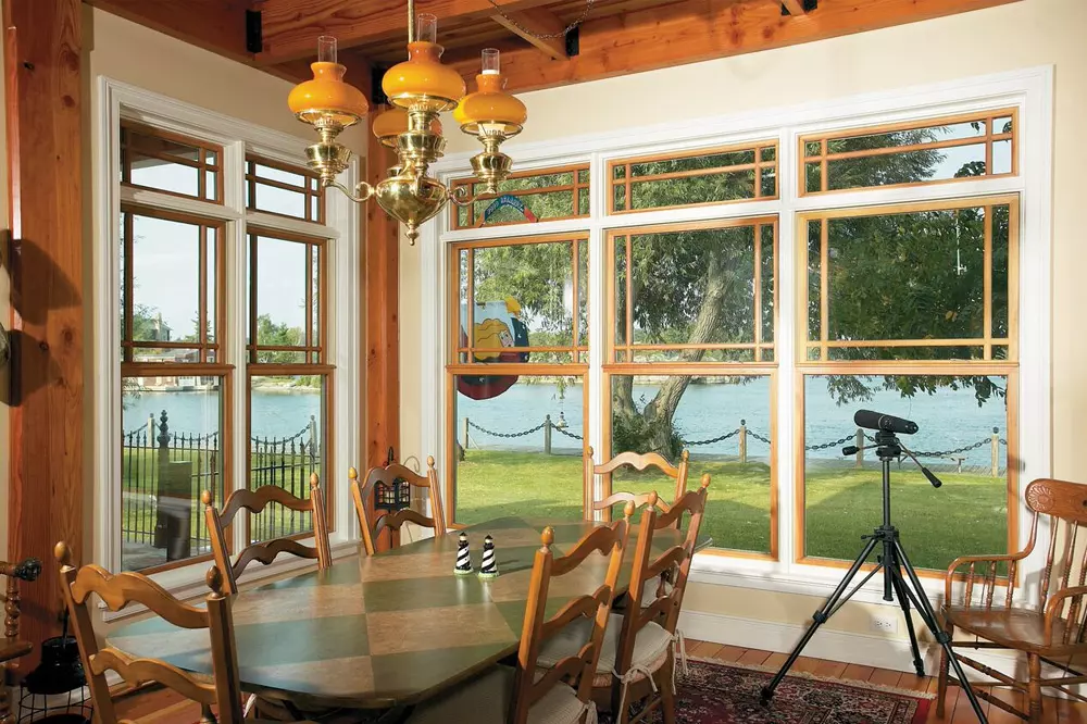 Premium wood double hung windows installed in dining room