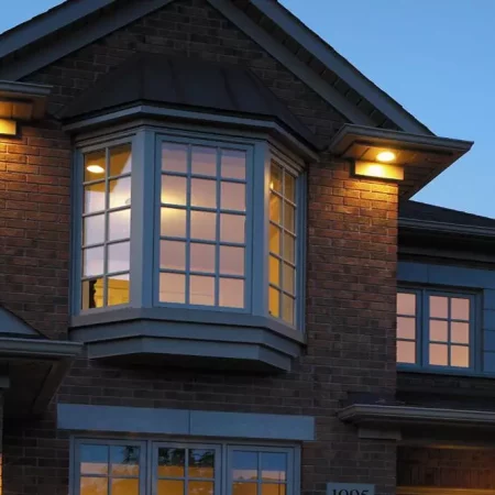 exterior view of bay-bow window on brick house