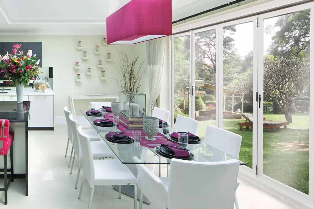 dining room with Panaview Folding Doors leading to backyard
